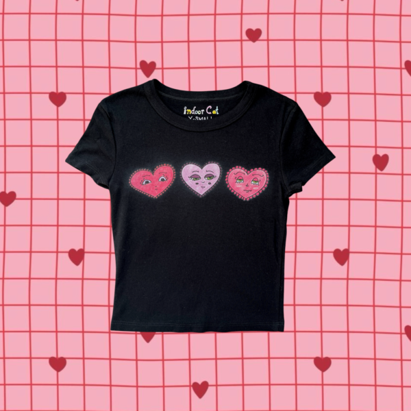 hand-drawn emotional hearts printed on a black baby tee